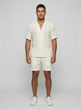 Two-piece short-sleeve shirt and shorts set — On Model - Neutral | Generated by Modelize